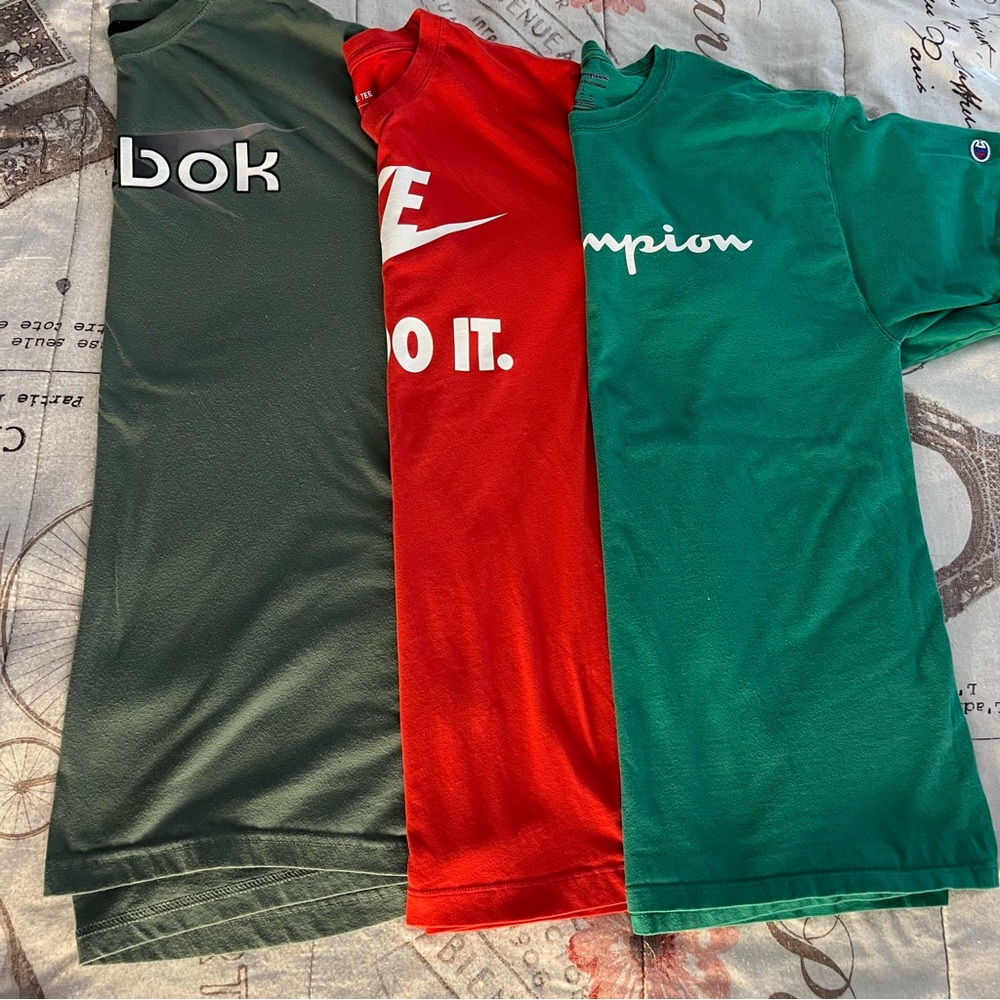 Three Reebok, Nike, and Champion T-Shirts - Green, Red all large